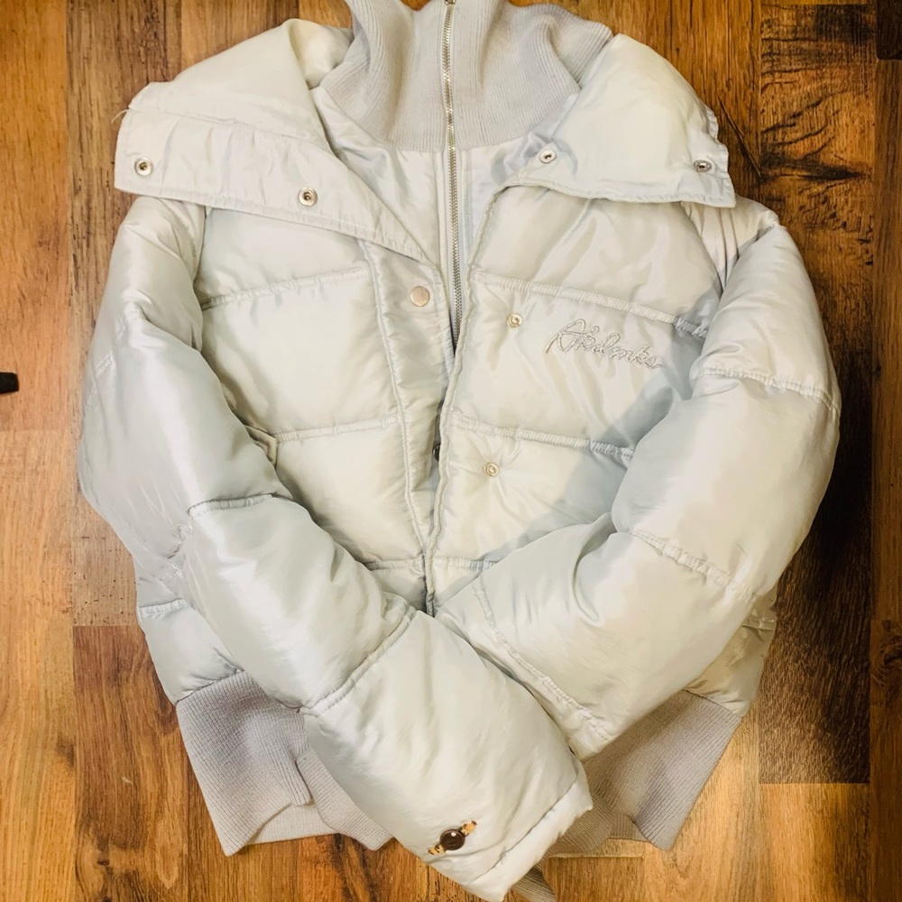 Akdmks puffer/biker jacket in the color gray, body hugging material .